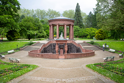 Fountain in the park surrounded by greenery