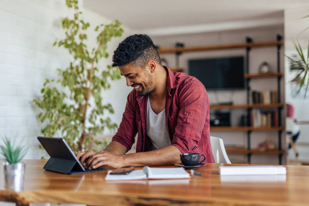 istock Adult man, taking inspiration online. 1322518365