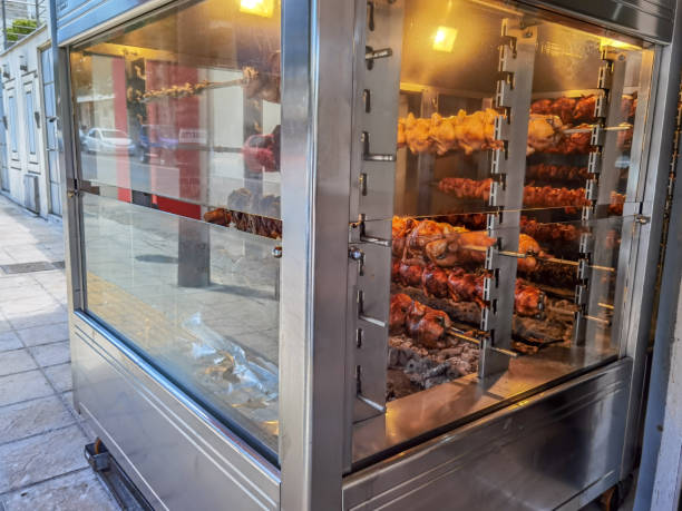 grilled spit chickens, mobile wagon grill on pedestrian street