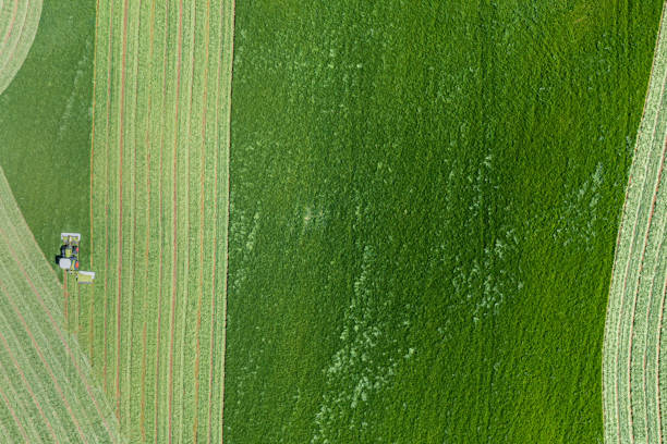 istock The view from a drone of a tractor in a field 1322523580