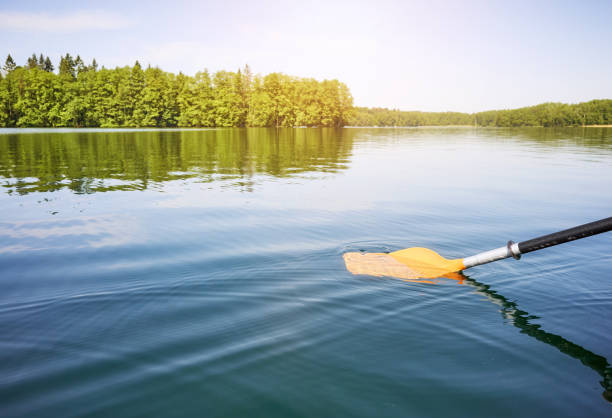 istock Kayak paddle in the water. 1322526389