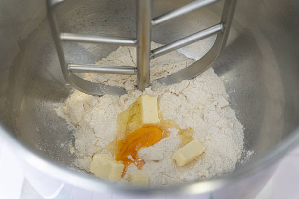 istock close-up of mixing machine preparing dough 1322527366