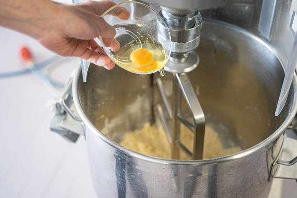 istock close-up of mixing machine preparing dough 1322528470