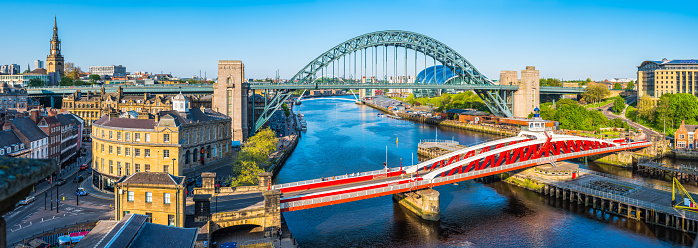 Aerial panorama over the River Tyne between Newcastle and Gateshead overlooking the Swing Bridge, the Tyne Bridge and the Gateshead Millennium Bridge, Tyne and Wear, UK.