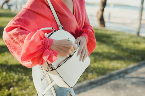 istock Young woman searching in her purse 1322530924