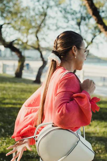 istock Young woman taking her purse 1322530999