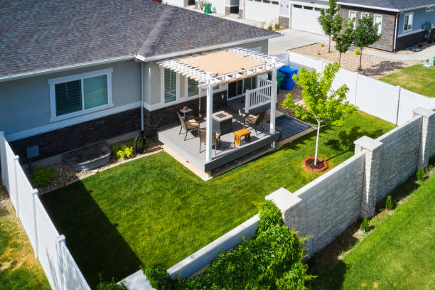 Backyard Deck and Pergola A backyard of a suburban USA home with a deck and pergola, aerial view. gazebo photos stock pictures, royalty-free photos & images