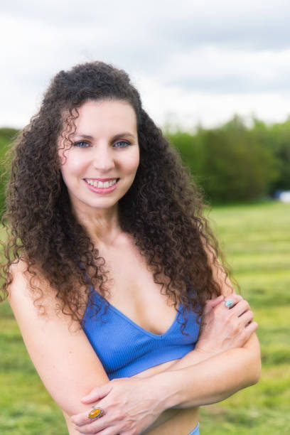 istock Lady with curly, dark brown hair 1322531831