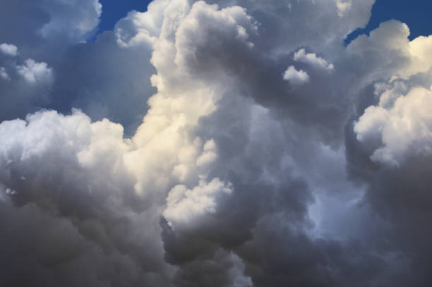 istock Dramatic Sky with Colored Steam from Factory 1322533340