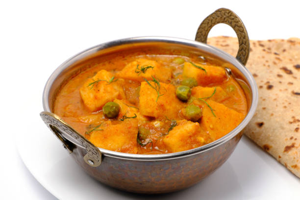 istock Indian style cottage cheese dish or curry with roti 1322536204