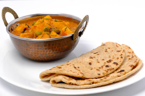 istock Indian style cottage cheese dish or curry with roti 1322536209