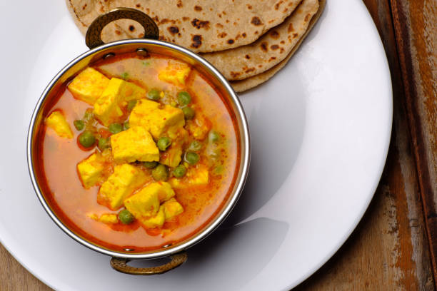 istock Indian style cottage cheese dish or curry with roti 1322536859