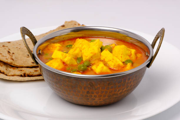 istock Indian style cottage cheese dish or curry with roti 1322536883