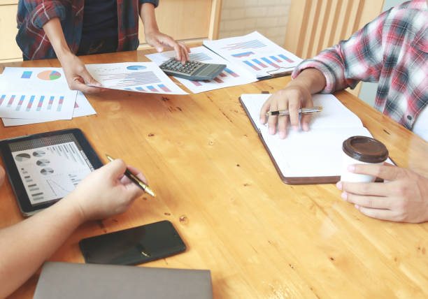 istock Team Businessmen are meeting for calculating and analyzing performance statistics for future investments.coordinate concept. 1322538261