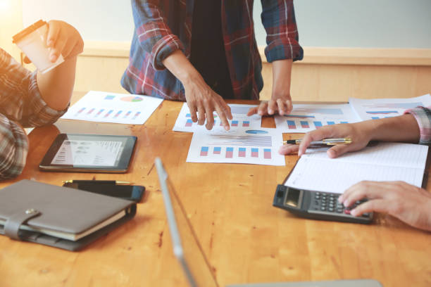 istock Team Businessmen are meeting for calculating and analyzing performance statistics for future investments.coordinate concept. 1322538272