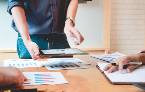 istock Team Businessmen are meeting for calculating and analyzing performance statistics for future investments.coordinate concept. 1322538298