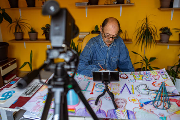 istock One senior artist drawing in his studio 1322539635