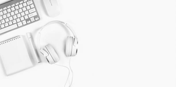 istock Banner on a white background, flat layout, keyboard, headphones, notebook. Concept - home office, online education, webinars, seminars, blogging training 1322539828
