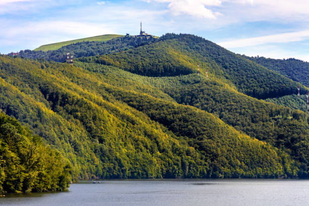 Miedzybrodzkie Lake and Beskidy Mountains in Silesia region of Poland Zywiec, Poland - August 30, 2020: Panoramic view of Miedzybrodzkie Lake and Beskidy Mountains with Gora Zar mountain in Silesia region beskid mountains photos stock pictures, royalty-free photos & images