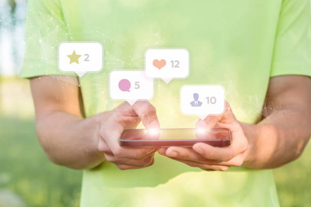 istock Man communicates on social networks on the phone on a blurred background. 1322554279