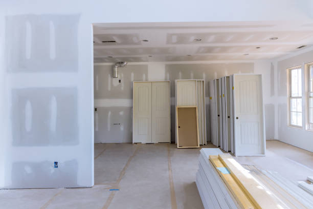 Interior wooden stacker door installation apartment building, wait installation for preparation of interior in new home Interior wooden stacker door installation,apartment building, a wait installation for preparation of interior in new home stacker stock pictures, royalty-free photos & images