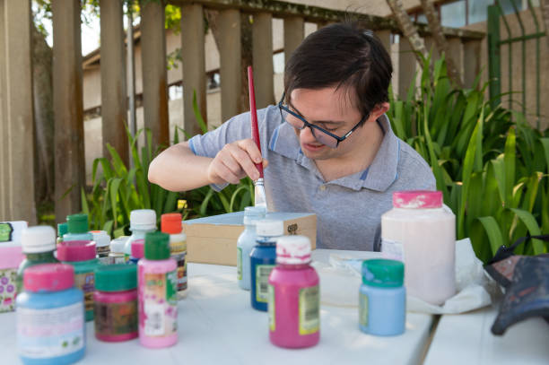 istock young man with down syndrome 1322559411