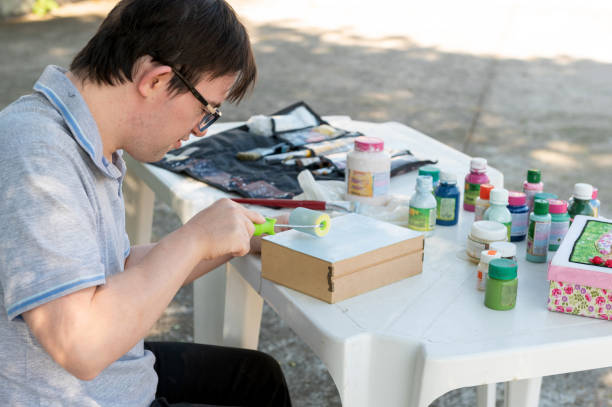 istock young man with down syndrome 1322559425