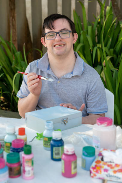istock young man with down syndrome 1322559429