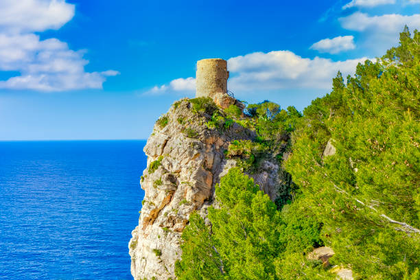 The Torre del Verger is an old watchtower in the municipality of Banyalbufar in Majorca The Torre del Verger is an old watchtower in the municipality of Banyalbufar in Mallorca banyalbufar stock pictures, royalty-free photos & images