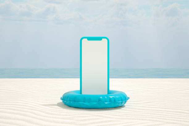 istock Empty Screen Smart Phone on Beach, Minimal Summer Holiday Travel Concept 1322564246