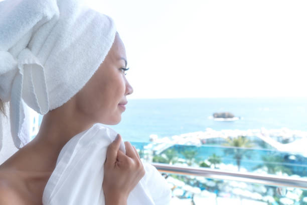 istock Attractive woman relaxing after shower 1322567396