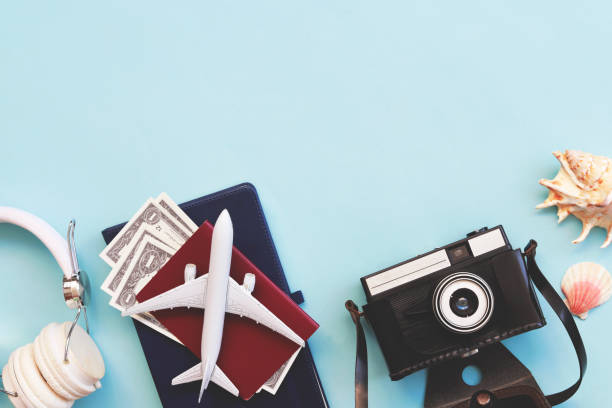 istock Travel accessories with copy space on blue background 1322573231