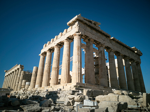 Parthenon temple on a bright day. Acropolis in Athens, Greece, with a clear deep blue sky