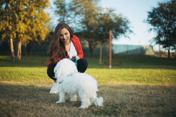 istock woman with dog 1322575518