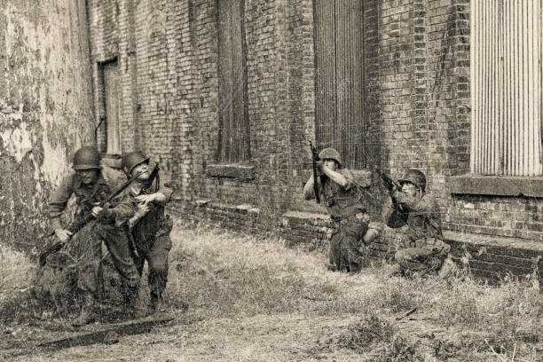 istock WWII American soldiers in combat 1322578749