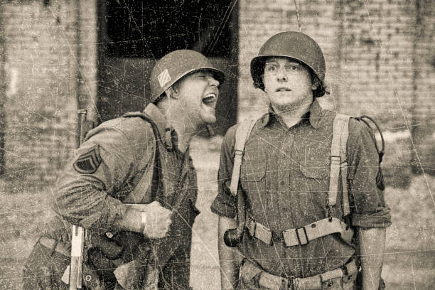 WWII officer yelling at soldier Antique sepia photo of a WWII Drill Sergeant yelling at soldier armed forces rank photos stock pictures, royalty-free photos & images