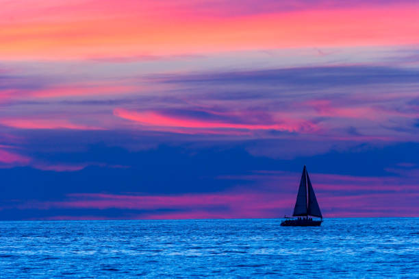 istock Sunset Ocean Sailboat Dusk 1322582741