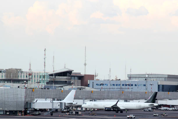 istock Airplane settling on runway to take off or land 1322588223
