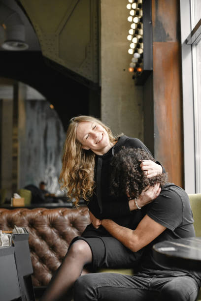 istock Mixed couple spenting time together in a cafe 1322594081