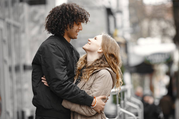 istock Mixed couple spenting time together in a spring city 1322594224
