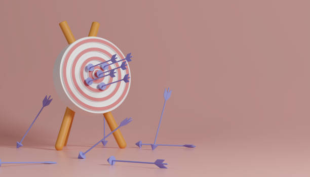 bersaglio tiro con l'arco con frecce viola. - dartboard target bulls eye sport foto e immagini stock