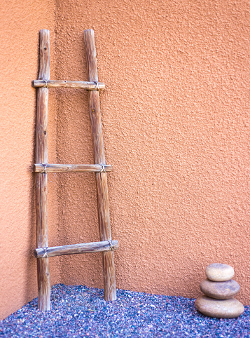 Santa Fe Style: Kiva Ladder Against Orange Adobe Wall