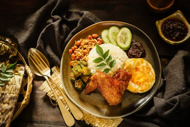 Photo of Nasi Lemak, the Malay Aromatic Rice Dish with Side Dishes