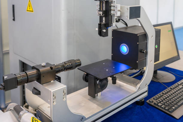 istock close up view of optical goniometry machine in factory. 1322603497