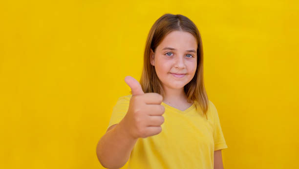 istock Teenager showing thumbs up 1322604351