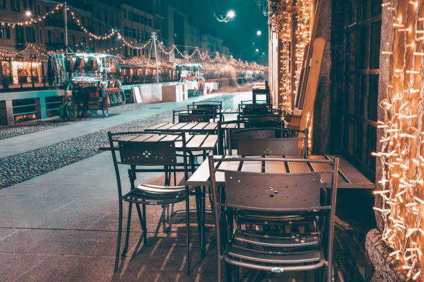 istock Christmas decorated milanese streets by late night. 1322611701