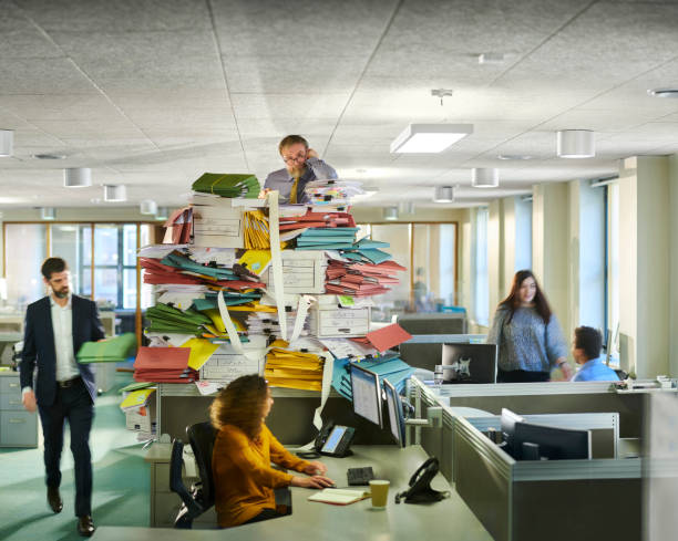 paperless office office worker gets yet more work from his boss managing stress stock pictures, royalty-free photos & images