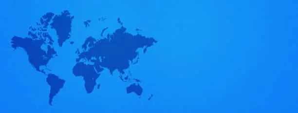 World map isolated on blue wall background. Horizontal banner