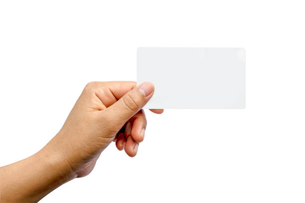 istock Hand holding paper isolated on white with the clipping path. 1322616340