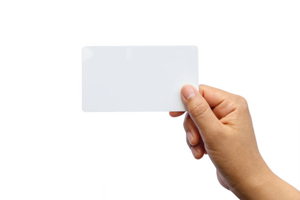 istock Hand holding paper isolated on white with the clipping path. 1322616359